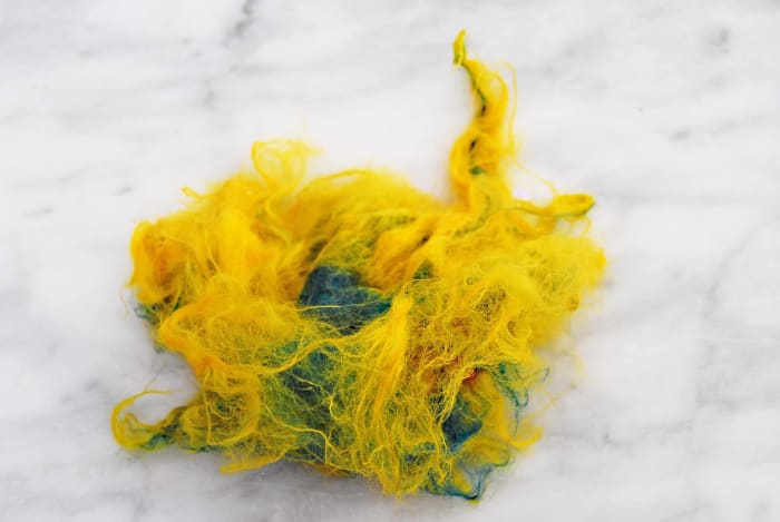 After throwing it hard at the counter top it looks decidedly well worn. In retrospect perhaps the fibers could have been laid a little thicker and worked a little harder but still salvageable