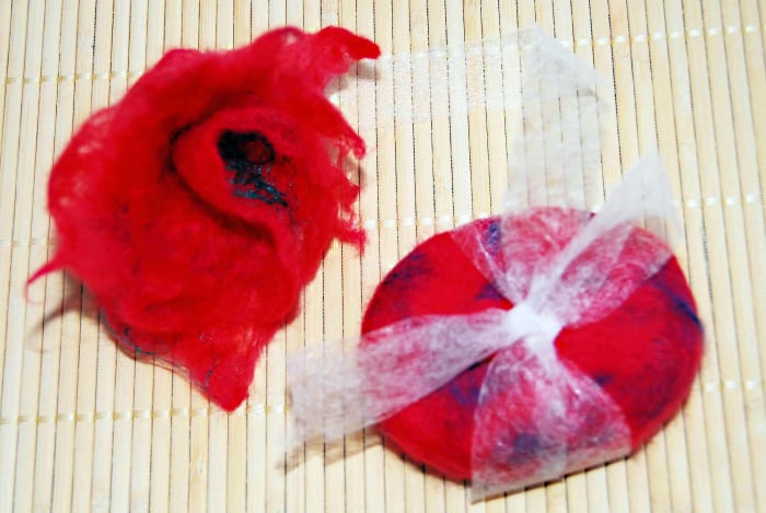 Tie dried soap with a bow and add a felted flower hair clip to the top of your little gift box