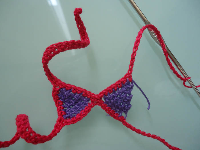 The third side is like a letter U going down from one necktie, down and up the 2 triangles, and up the second neck tie. The last side just goes down the tie and continues on to the first tie you made.