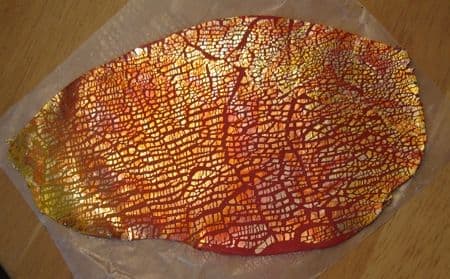 The metal leafed Skinner blend sheet after running it through the pasta machine to crackle the leaf