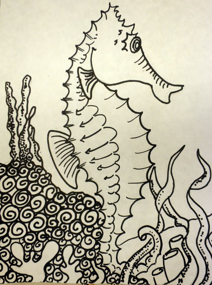 Finsished drawing of a seahorse completed in black Sharpie. You can add in all the details inside the seahorse and also draw in his habitat.