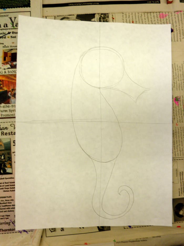 In step #3 add the curling tail of the seahorse. Try to keep the tail on the paper otherwise your seahorse will not be complete.