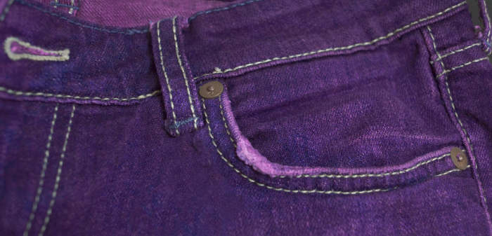 Give your denim a new lease on life by dyeing your jeans a different color. These jeans were colored with Rit dye.