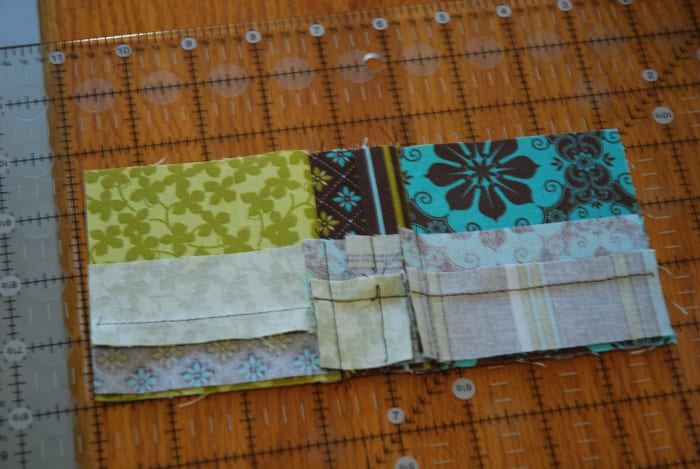 Always lay the small piece over the large piece to line up fabrics (I exaggerated the edge in the picture so it would be clearer to see).