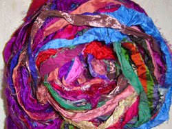 Sari ribbon is also good for crotchet and knitting and is also flexible. It produces a more textured result.