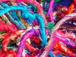 Wire sari yarn does not bend easily and is no good for crotchet and knitting, unless bend is not required in the work - suitable for round floor rugs and circular work.