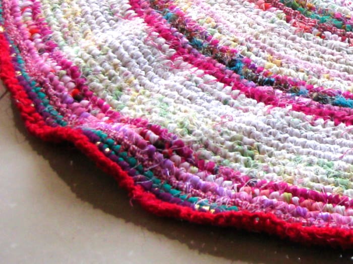 Too much increasing of stitches will make the edges of the rug frilly like this, and it won't sit flat.