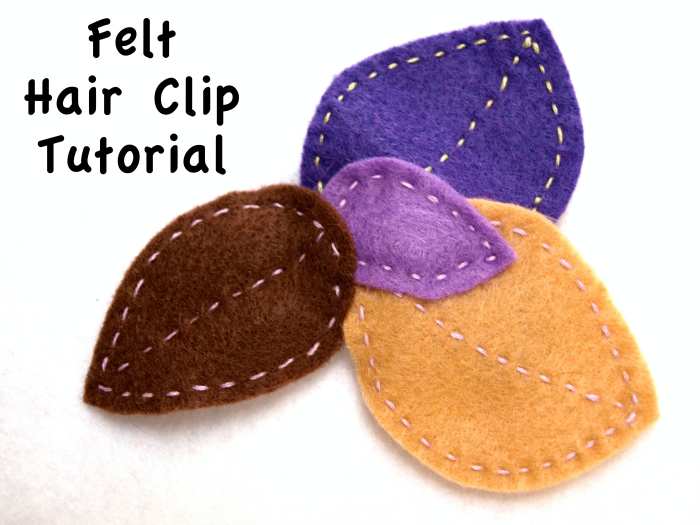 Free form leaf shapes in subtle colors give this barrette an autumn flavor. No template was used when cutting the shapes and the running stitch anchors the leaves to the clip.