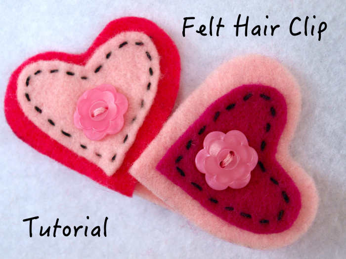 Hearts are a great design for a barrette. Buttons and the running stitch were used to help anchor the hearts to the clip.