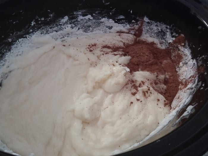 Add the tablespoon of cocoa powder to just one area of the base, leaving a good portion of it uncolored. Stir only in the general area where you added the cocoa.