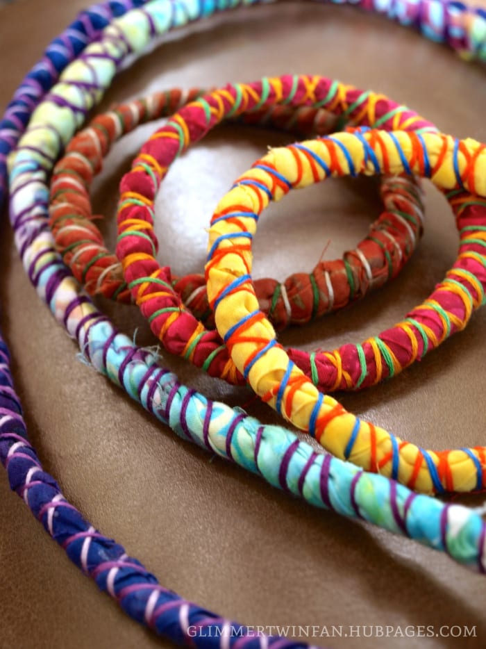 Wear them separately or all together for a fun and funky look. These fabric wrapped cord bracelets and necklaces jazz up any outfit!