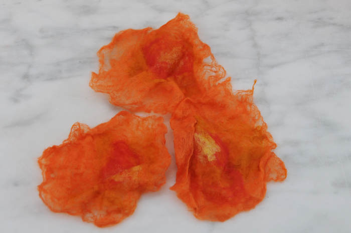 Rinse and full the flowers by dropping them onto a hard surface such as a marble table or draining board