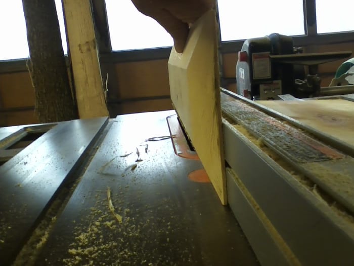 For the sake of the picture, I removed the guard. This can be very dangerous without something to hold your work. Keep fingers away from blade!