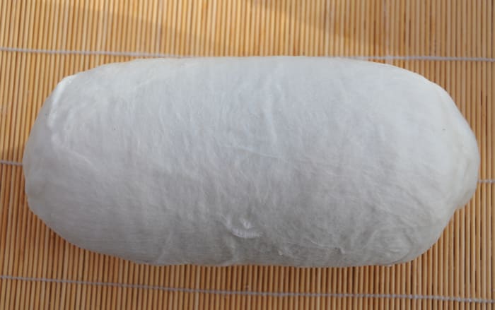 The Wool Covered Party Balloon. Ensure both ends are covered with wool and that the layers are even throughout the project.