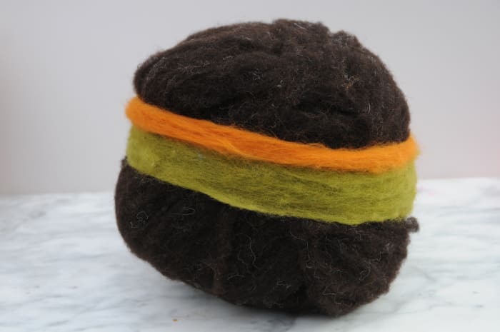 Wrapping a few stripes around the Gertie ball to add a little color to the shoulder bag.