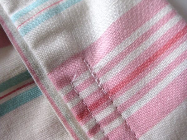 An example showing the forward/reverse stitching near the opening (where the vertical pins were).