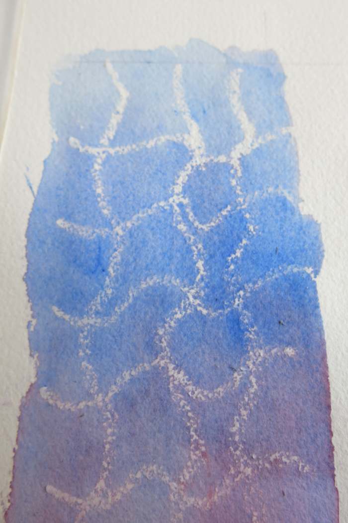 Simple marks with a white crayon, grease pencil or candle can create beautiful results in watercolor.