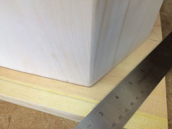 Use a straight edge to lay out the hexagon for the base and roof sections, and then continue the process for the smaller sections.