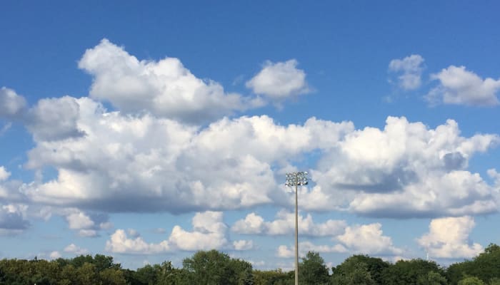 A beautiful cloudy day reference photo I have taken one day from up the steps at the stadium.