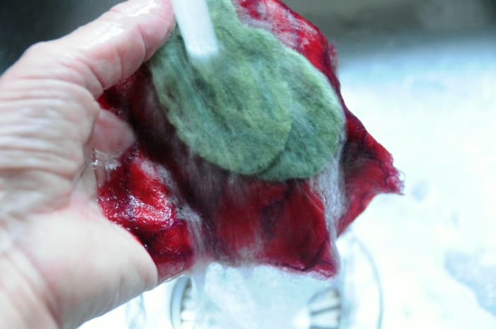 Rinse all the items in Hot and Cold Water and then 'Full' by throwing the against the kitchen sink. Iron the Red Petals Flat.