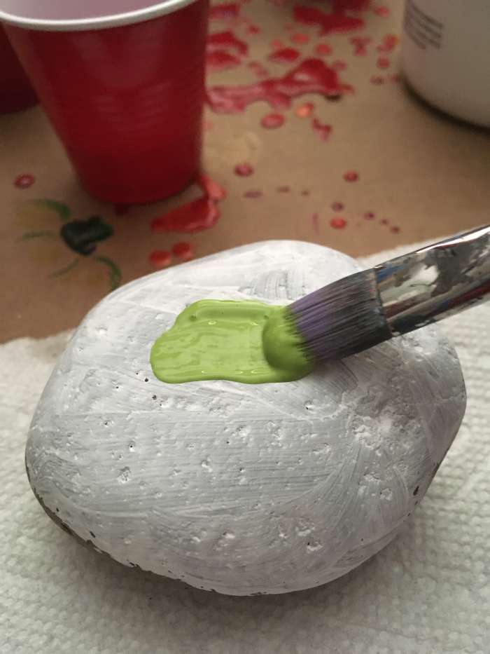 Plan to do two coats of paint onto each stone's face. This will increase opacity and will help the marker last longer outside.