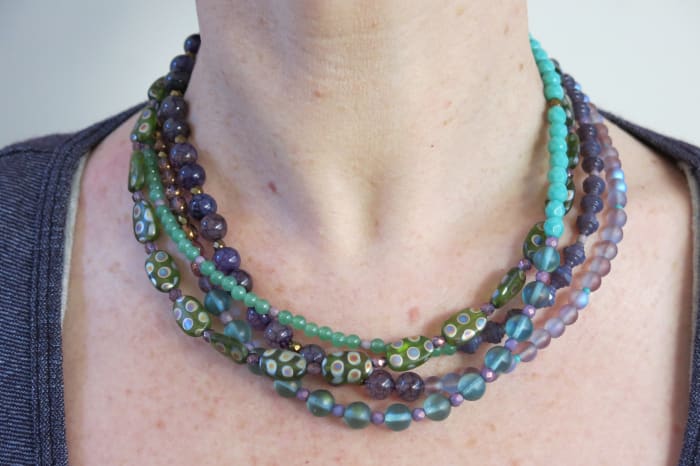 You can change the order of your strands of beads to create a different design to your beaded necklace.