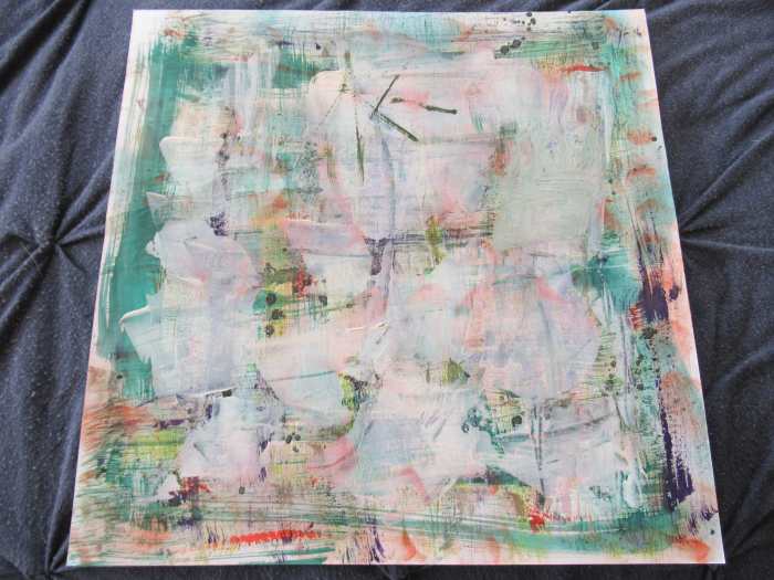 I always keep a piece of reasonably heavy 12" x 12" white card stock near my work area. I use a left over credit or gift card or a spatula to take any left over inks or media. Use these for art journal or scrapbook pages