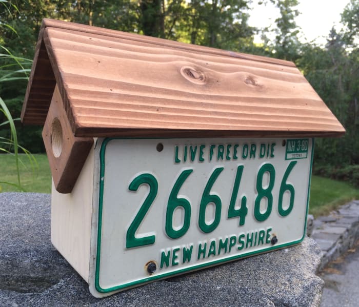 The finished condo duplex birdhouse. Note how the wider roof section overlaps the narrower piece to form the peak.