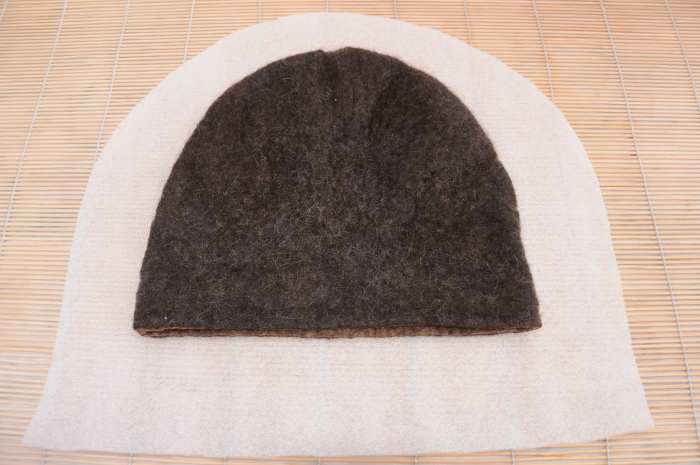 5 cm was cut from the bottom of the hat before inserting the bun into the hat cavity.