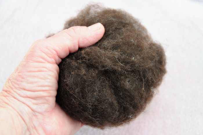 The merino wool oddments covered with a layer of Jacobs fleece. Wet with soapy water and roll gently on a towel covered flat surface until smooth.