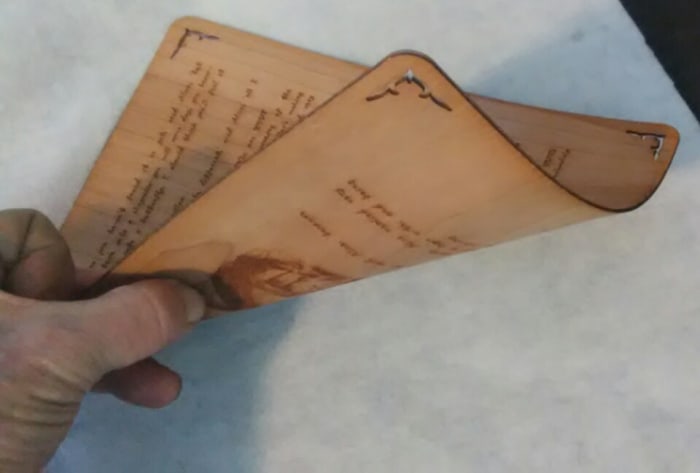 Bending of each individual page was made possible using micro veneer with all the grain going in the same direction.