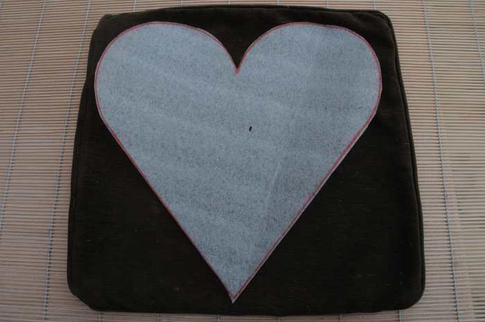 The heart should almost cover the cushion you will be using. It will shrink during the felting process.