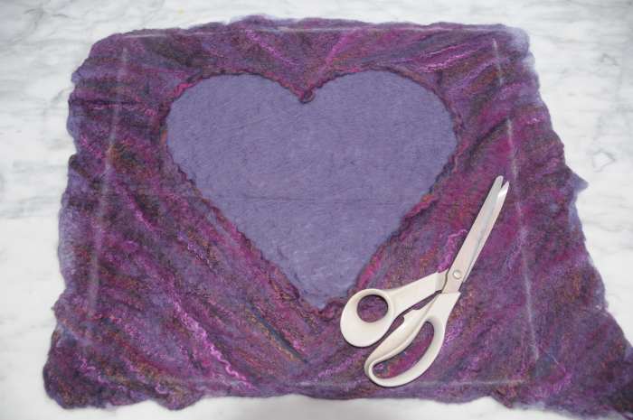 Trim the cushion cover to size. Mark with chalk, and then draw the lines with a ruler.
