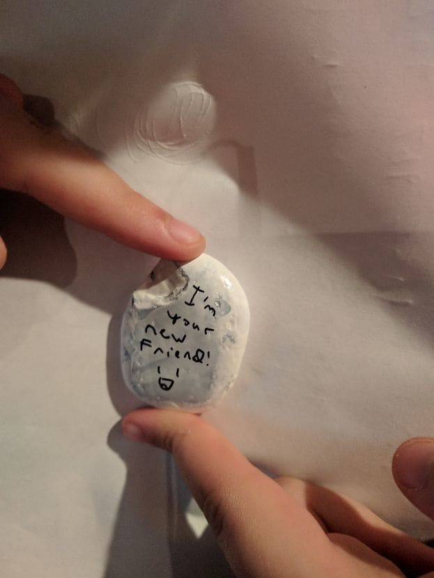 Here's the surprise message my daughter put on the back of the kindness rock to make someone smile after picking it up.