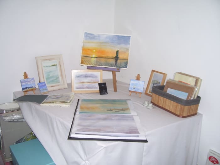 Display area in the author's studio. The two door handles are not part of an art installation, they're ready for when I've finished redecorating a storage cupboard!