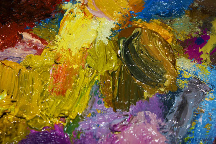 Mixing color on the palette and applying it with unusual tools can create very interesting textures and edges.