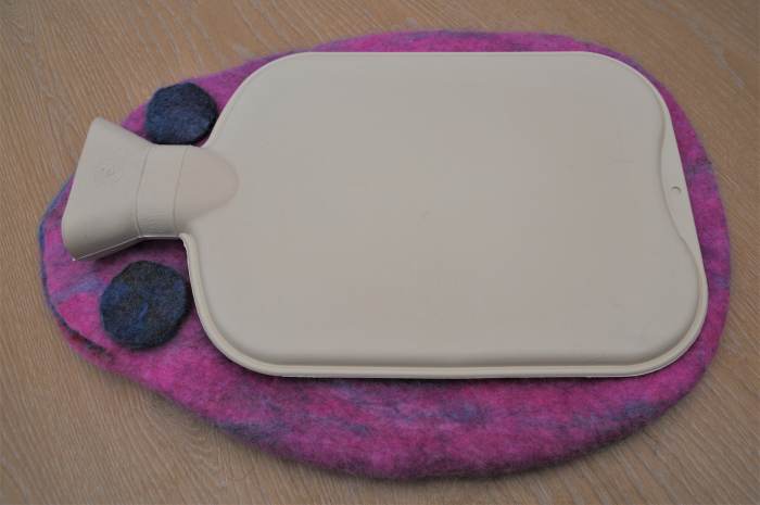2 Felt pieces (left over from a previous project) can be cut into rounds and placed on each side of the neck of the water bottle.
