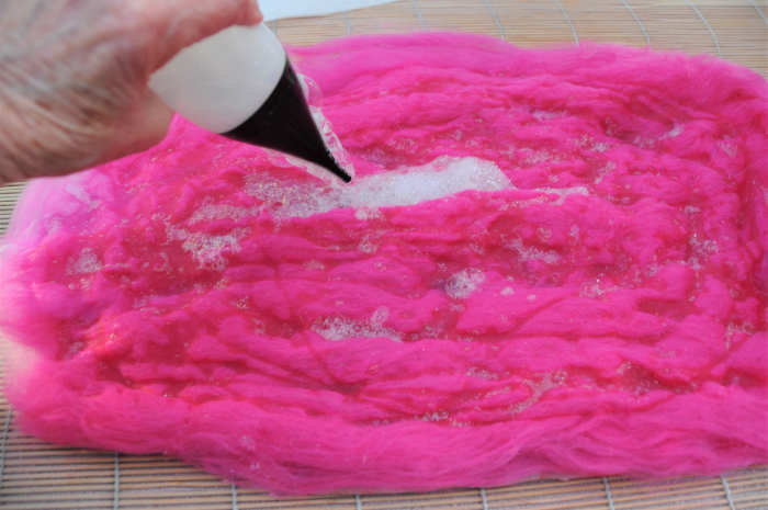 Cover both sides of the template as before. Repeat until you have 3 even layers of fiber on both sides.