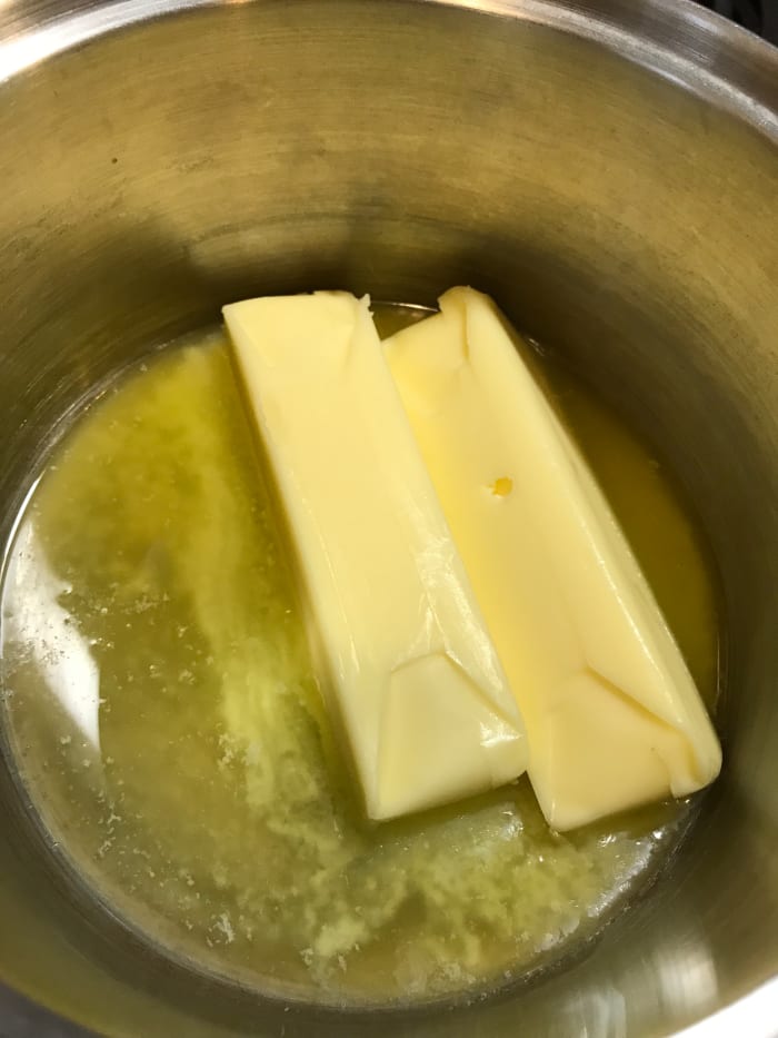 You'll need a cup of butter. I use salted, but use what you prefer. I don't know why I started to melt the butter. It's completely unnecessary, as it'll melt just fine in the hot sugar mixture.