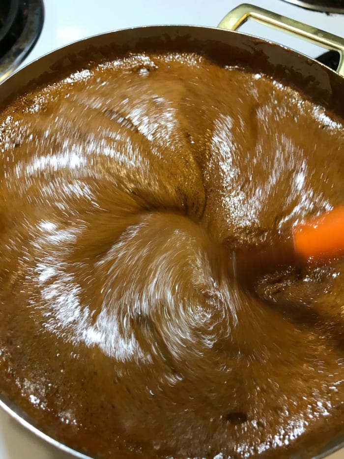 The baking soda will make the mixture foam up to a bit more than double in volume. This is why you want a saucepan much larger than you think you need. You don't want liquid sugar overflowing the pan. Impossible to clean, and worse—dangerous.