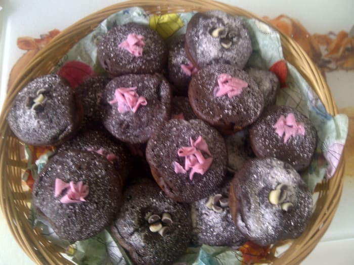 A basketful of homemade mini muffins, or sweets, or preserves makes a perfect gift anytime of year...for Christmas versions line the basket/hamper with Christmas themed tissue paper! Add bows! Have fun!
