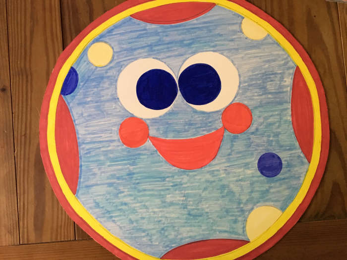 Red and Yellow Sharpies were good for the outside circles so were not covered with felt. My picture was colored because Plan A did not work! Draw the designs on the poster board with pencil and outline with black marker so they are easy to trace