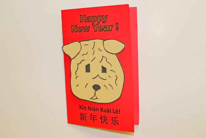 Sample Shar-Pei Card. The template for the card background is available above this post and the pattern for the dog's face is available below.