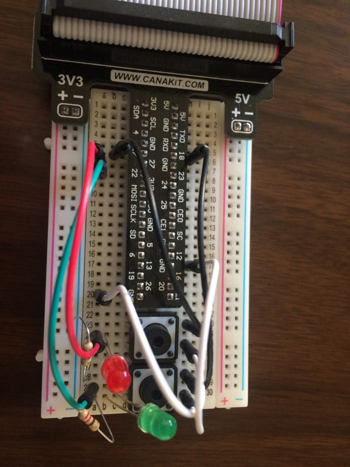 Red wire goes to Red LED and Green Wire goes to Green LED. Black wires are positive to the buttons and White wires are grounds.