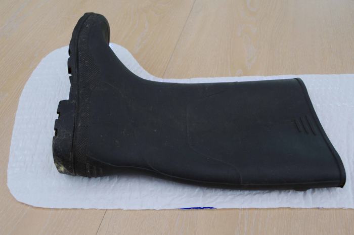 Checking the height of the boot on the template. For longer boots retain the complete length of the boots for your template.