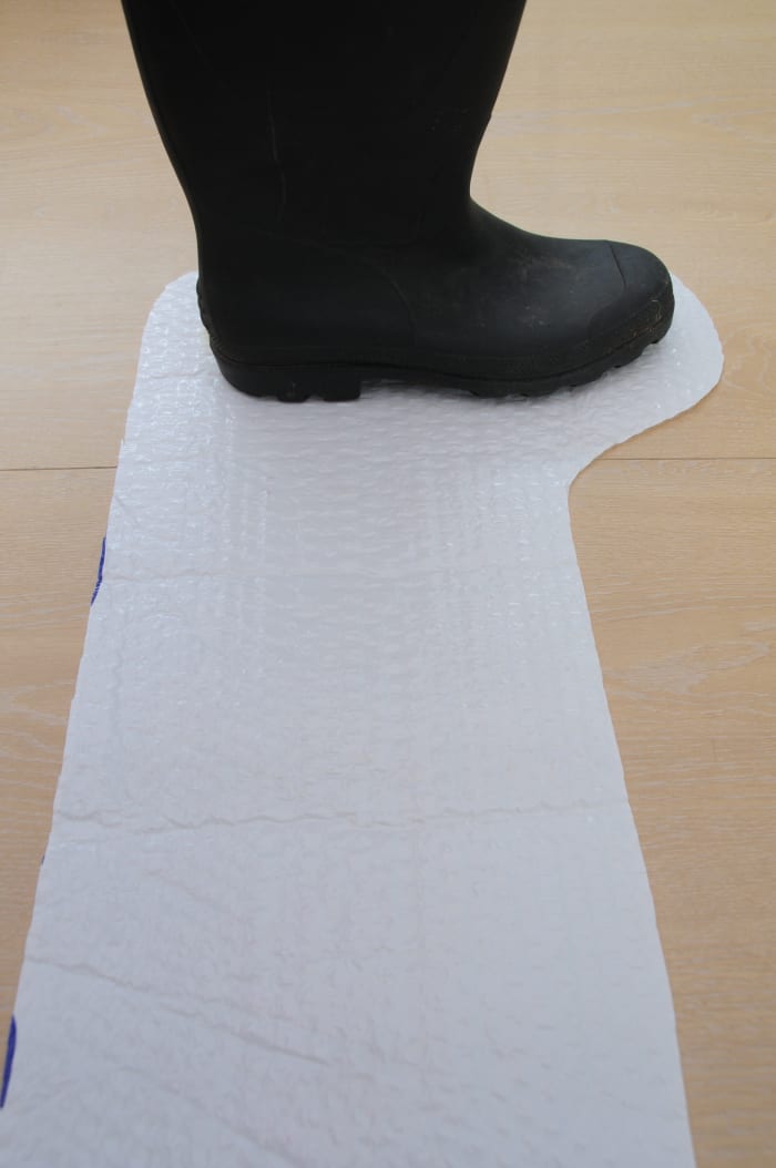 Adding a border which allows for shrinkage to take place during the felting process.