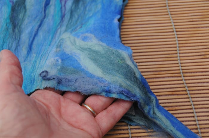 Keep the ties separate from one another by inserting a sheet of bubble wrap. The template is still inside the hat.