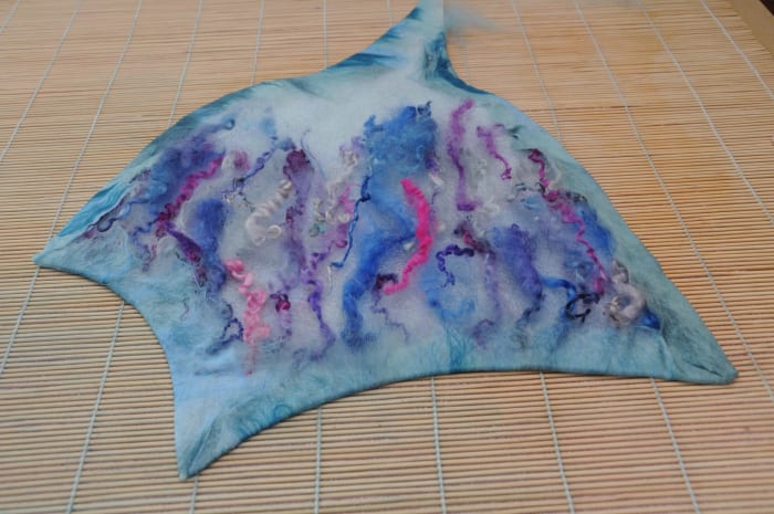 The edges of the template turned over and smoothed down using a little warm soapy water.