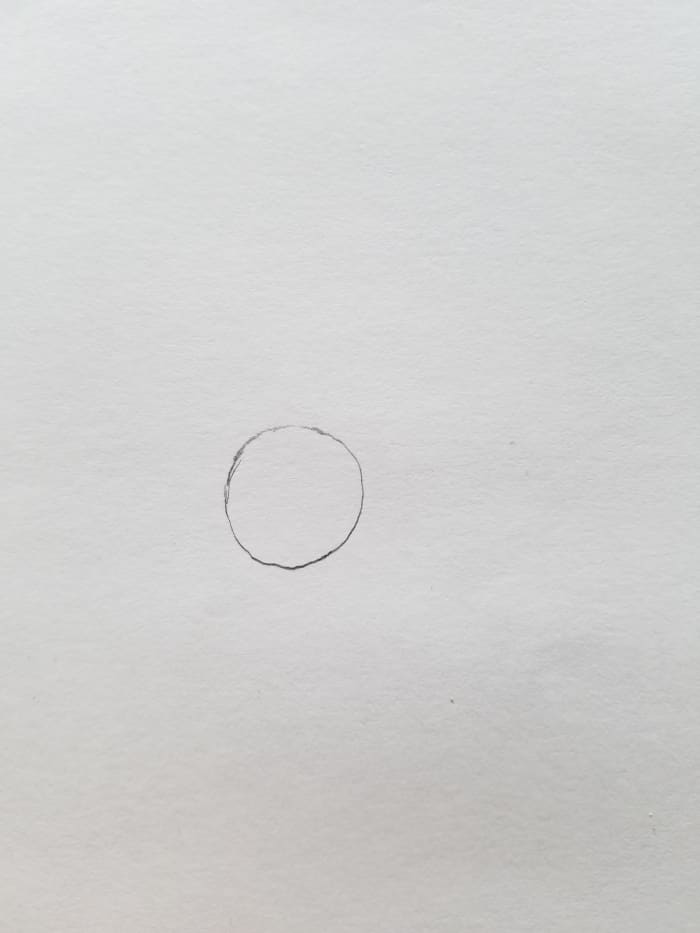 To get started drawing your Bootleg Bart Simpson begin with the eye. Draw a circle. This simple circle is a great way to gauge the size of your bootleg Bart or just to create a skeleton of points.