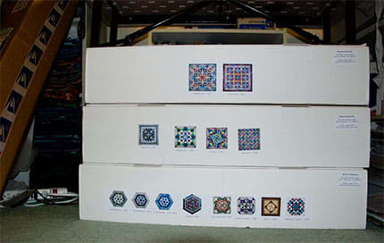 Consider boxes or other larger containers for storing sizable items, such as quilts. Make sure that they are cushioned appropriately.